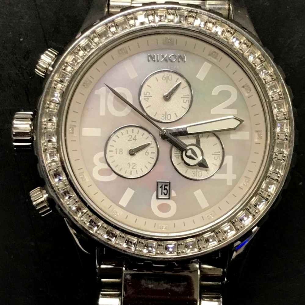 Nixon 42-20 Chrono with mother of pearl face with cz's all over